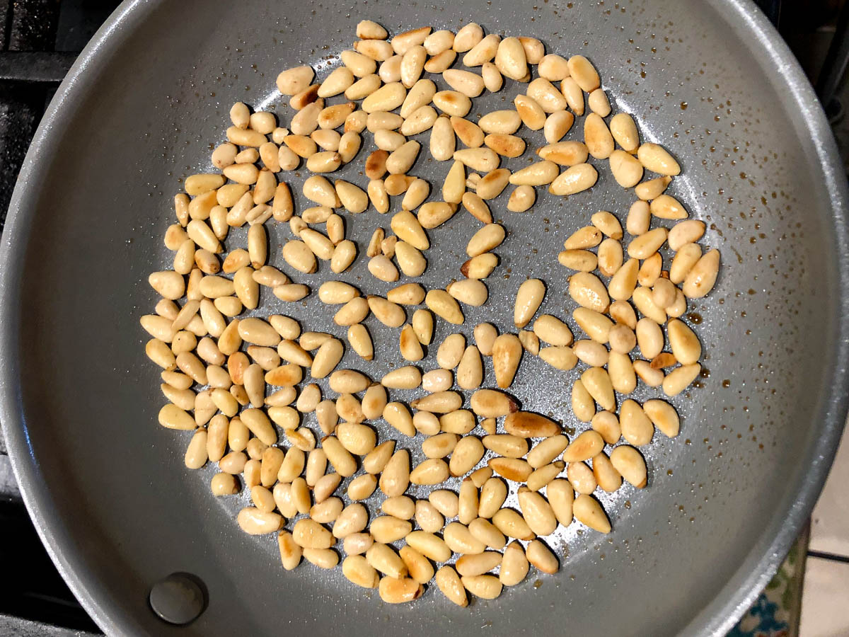 pan with toasted pine nuts