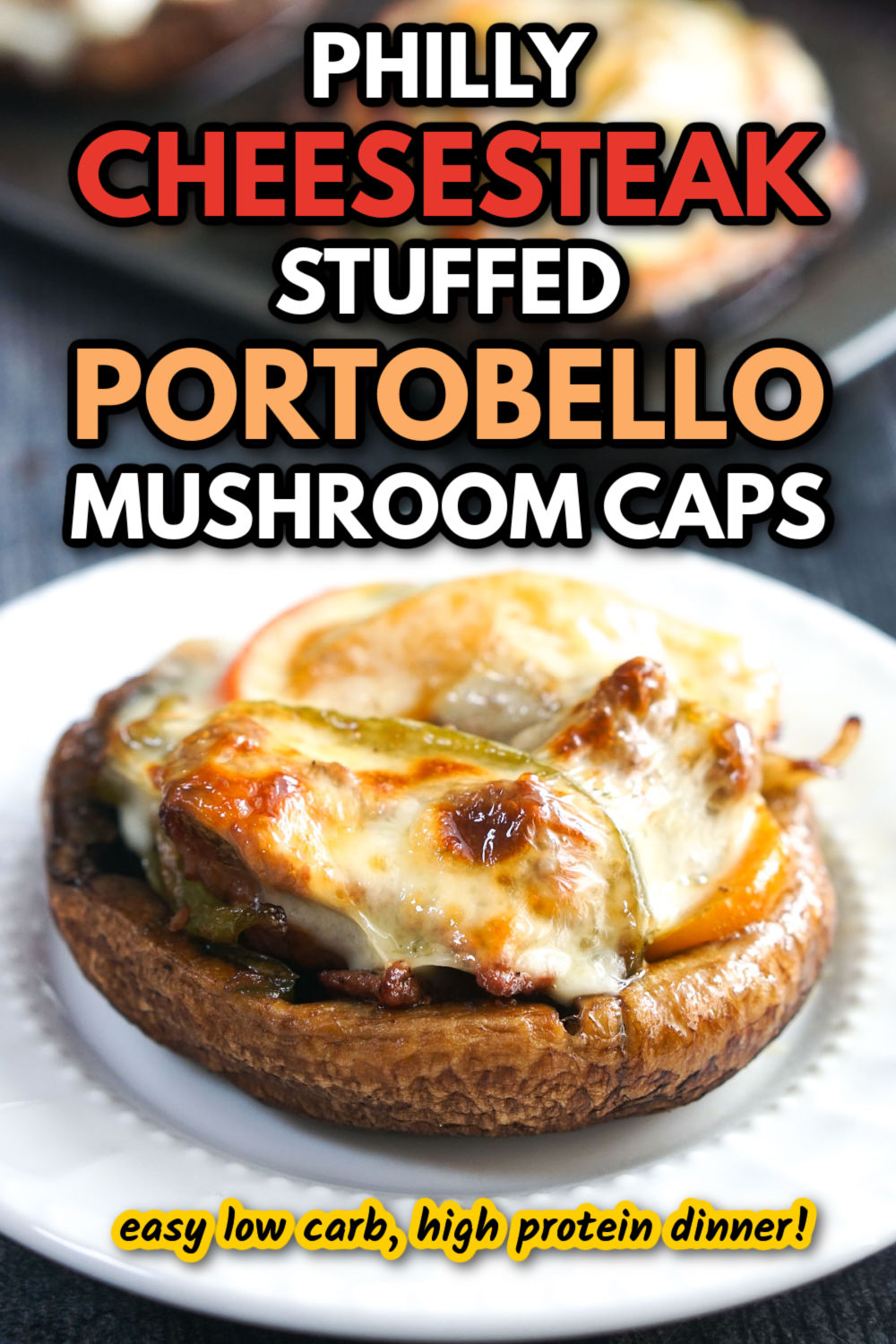 White plate with Philly cheesesteak stuffed portobello mushrooms and text.