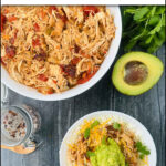 aerial view of white bowl and plate with shredded chipotle chicken and avocado and cilantro with text