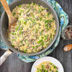 aerial view of pan and plate with creamy orzo pasta with veggies with text