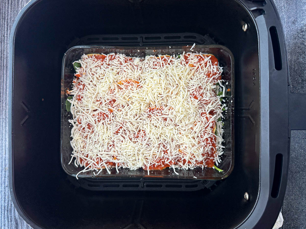 air fryer with uncooked lasagna