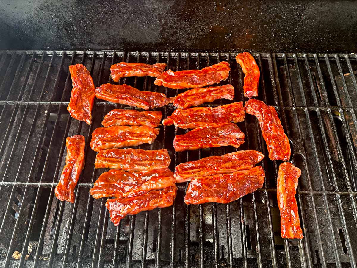 grill with raw glazed ribs