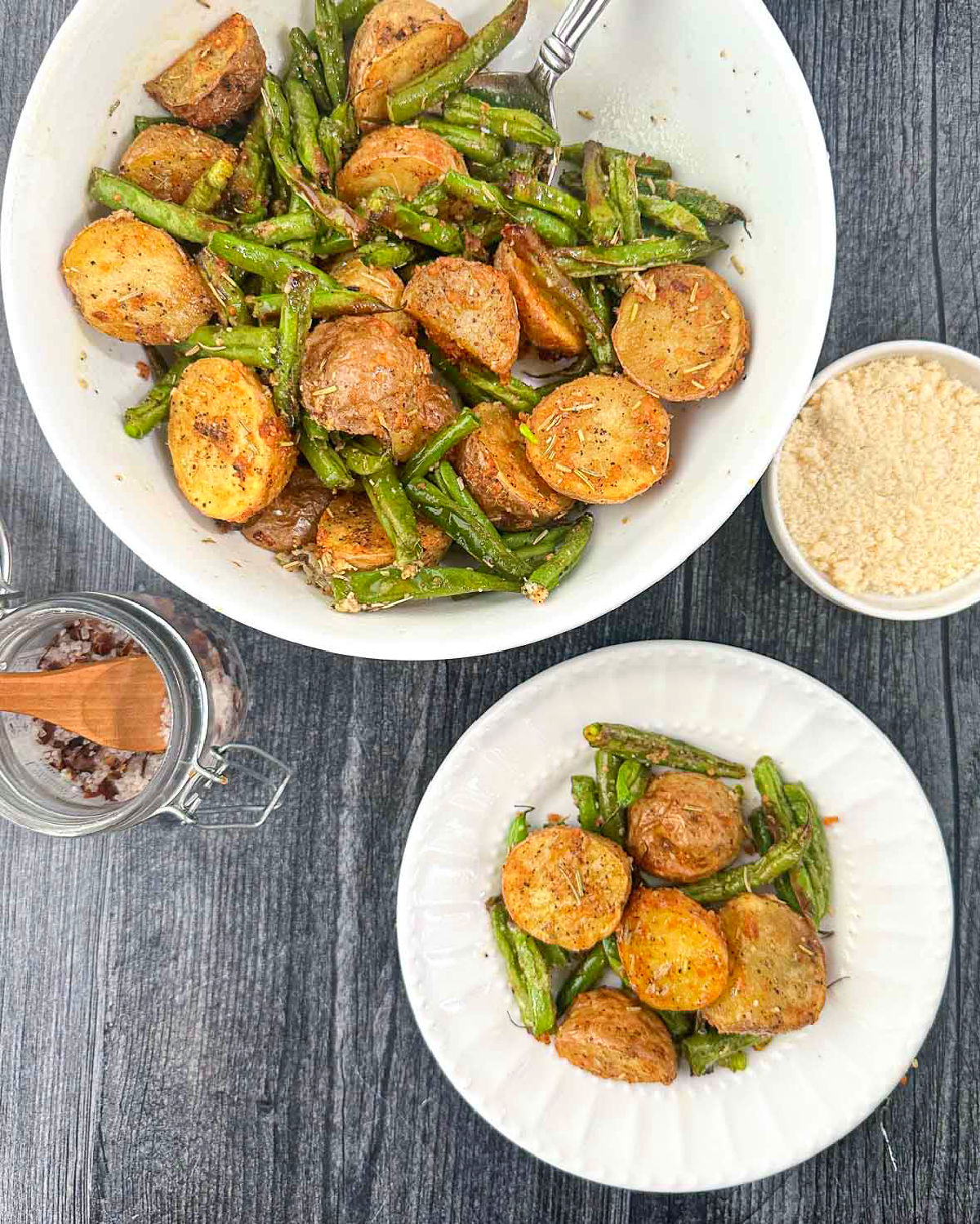 aerial view of bowls and plates with parmesan green beans and potatoes