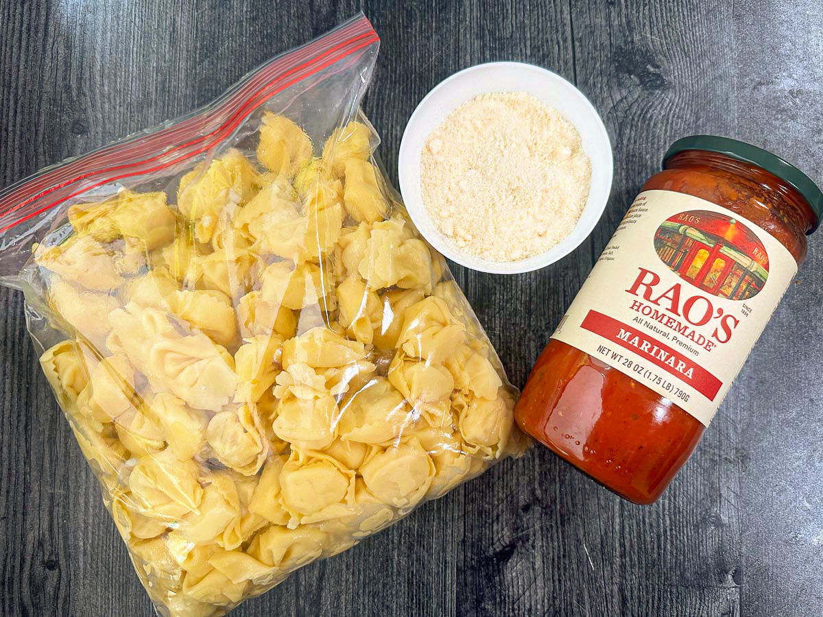 recipe ingredients - cooked tortellini, parmesan cheese and Rao's marinara