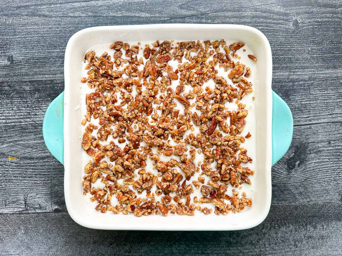 finished baking dish with pecans on top of the cottage cheese