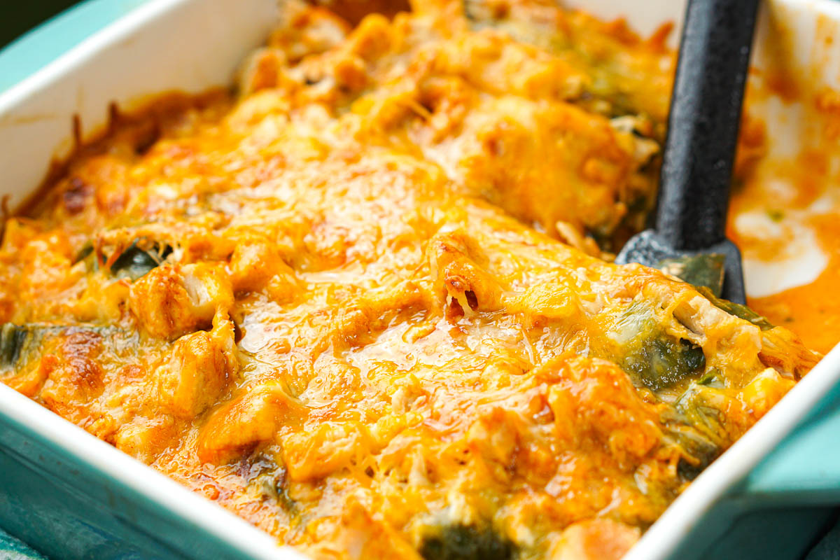 closeup of a baking dish filled with cheesy pepper and chicken Mexican casserole