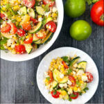 aerial view of bowl and plate of garden zucchini corn salad and text