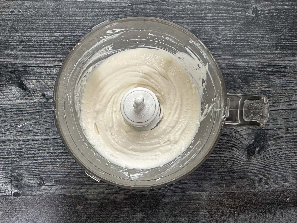 food processor bowl with whipped plain cottage cheese