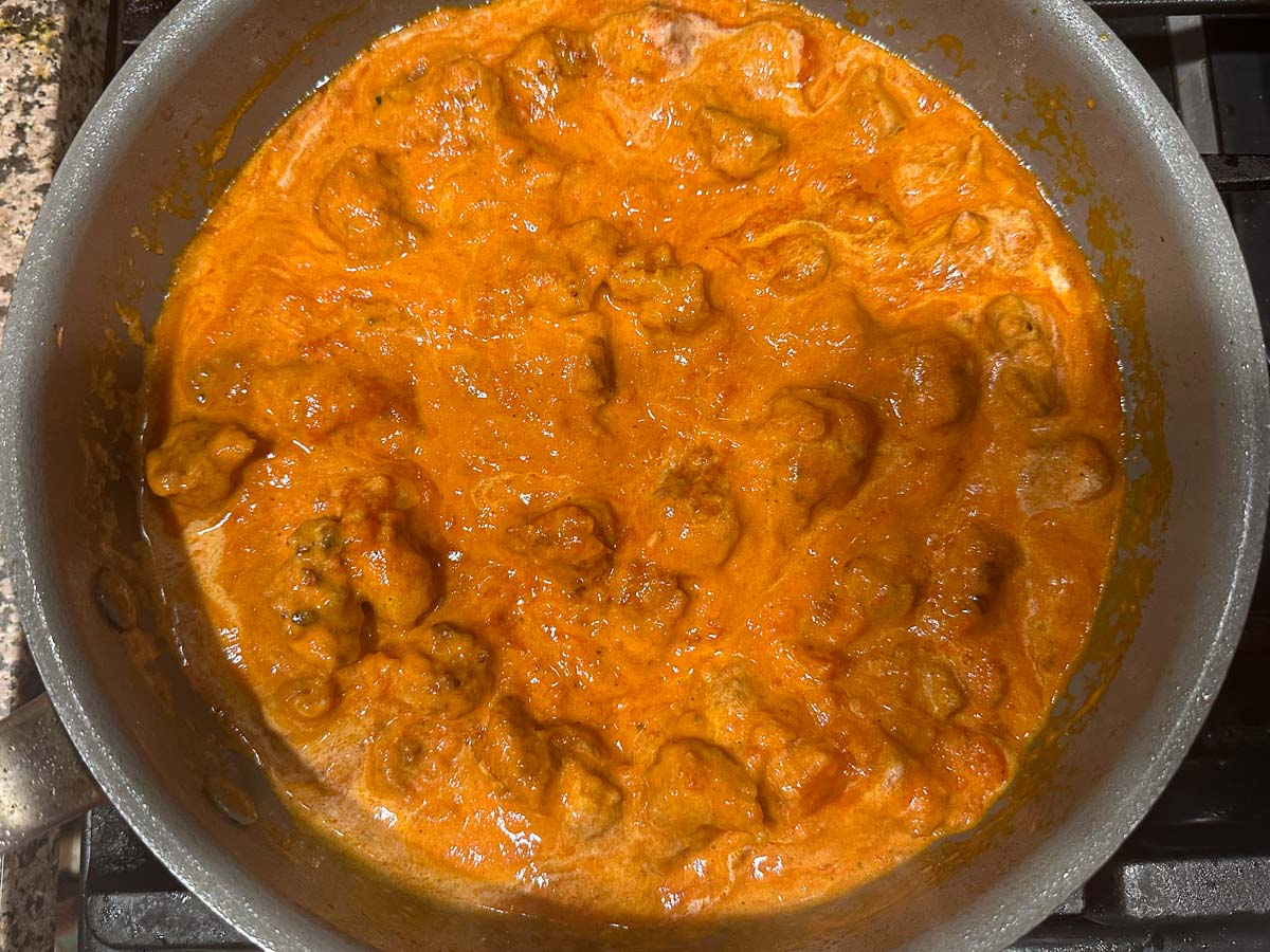 pan with creamy vodka sauce and sausage