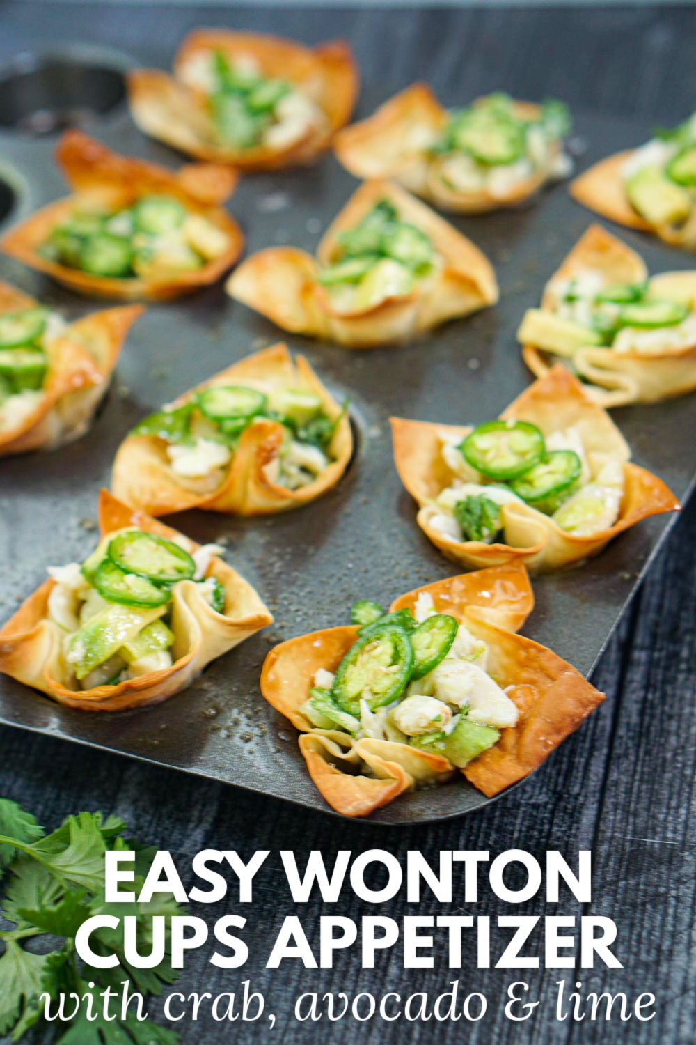 muffin tin with crab wonton cups and limes and jalapeños and text