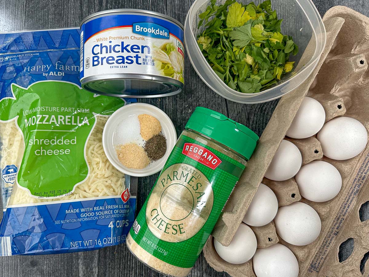 recipe ingredients - canned chicken, mozzarella, eggs, parmesan, spices and parsley