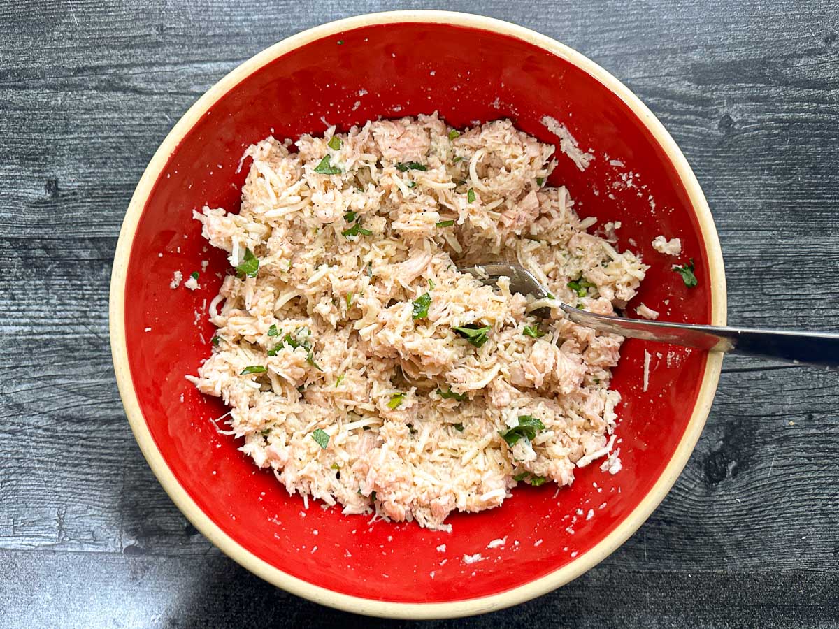 red bowl with canned chicken mixture