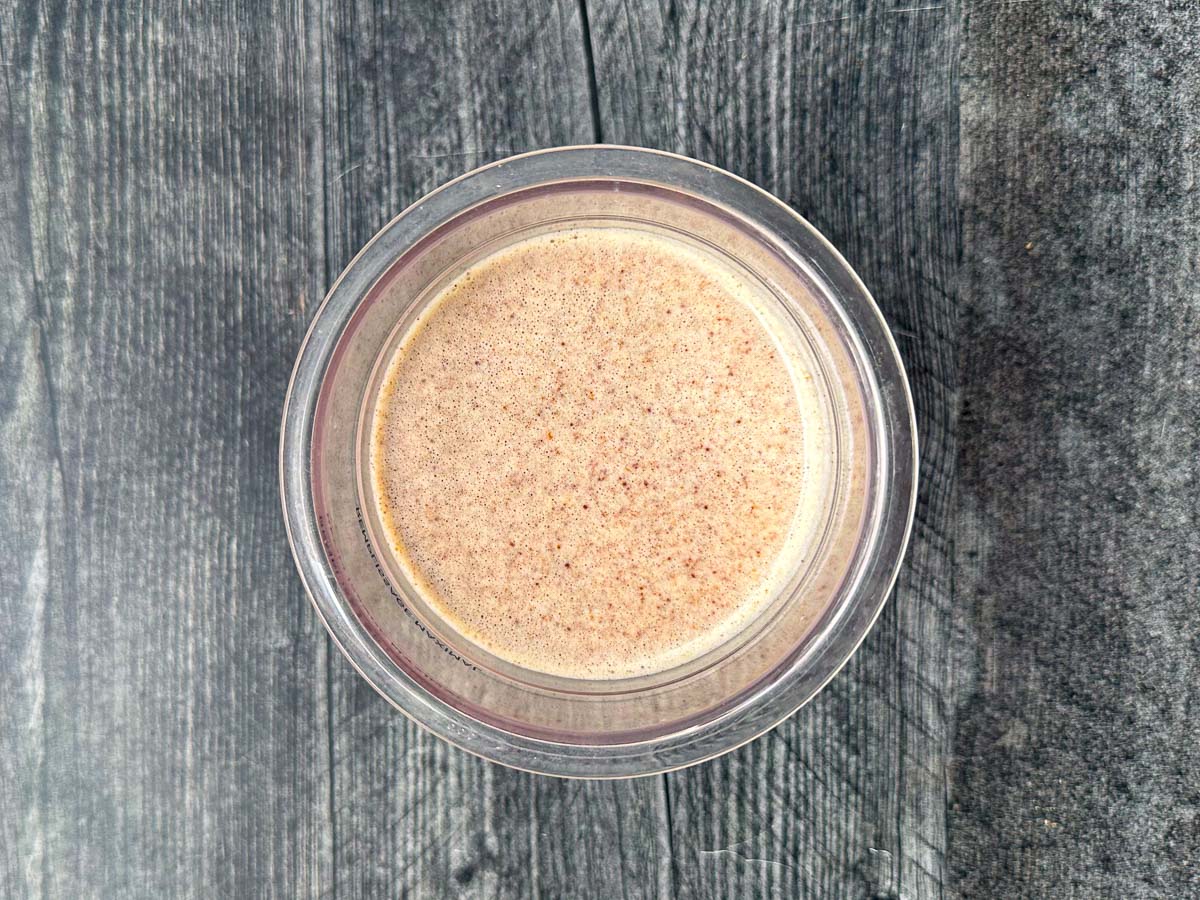 aerial view of a container with cinnamon protein shake