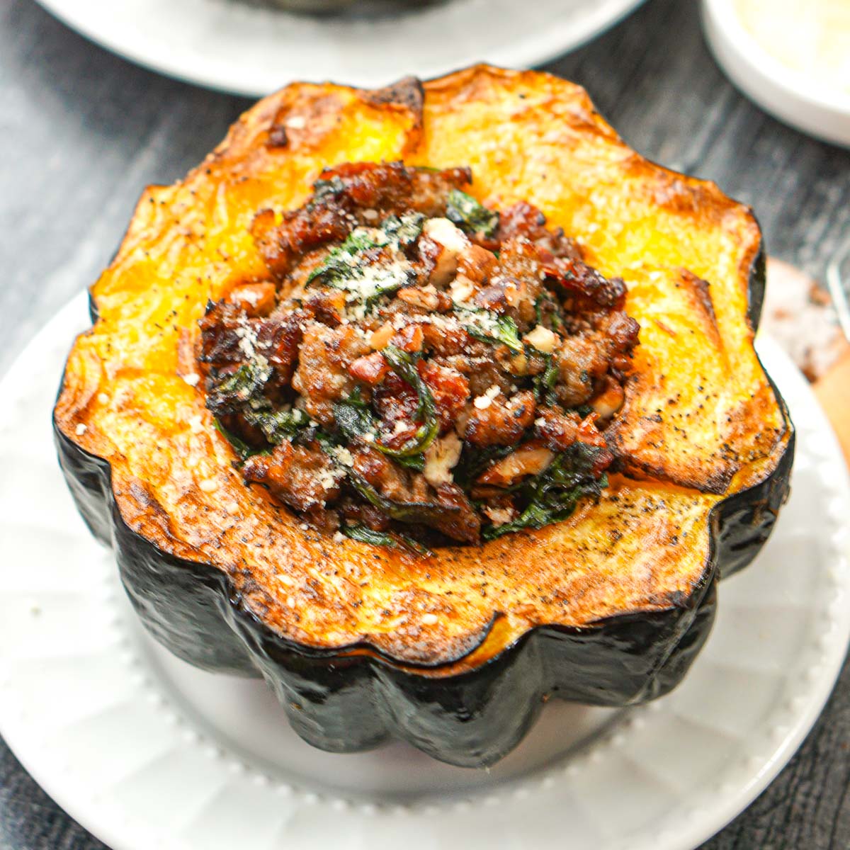 closeup of half of air fryer sausage stuffed acorn squash