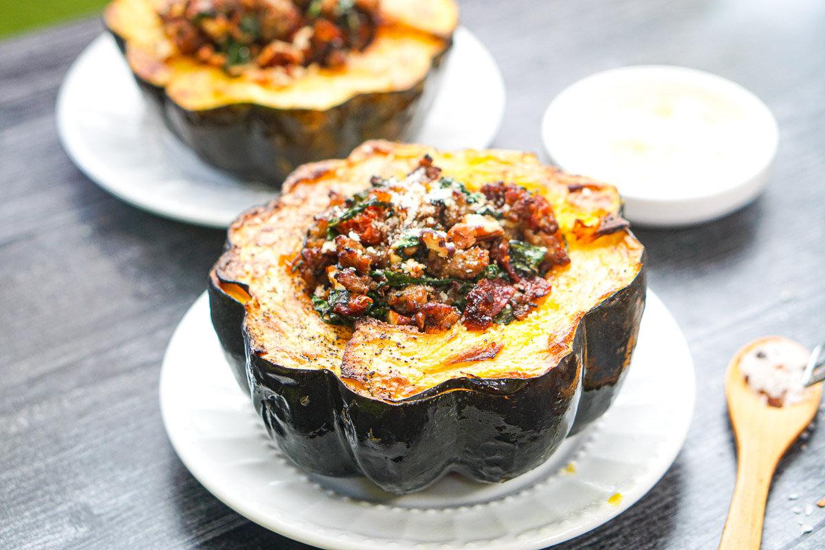 closeup of air fryer acorn squash stuffed on white plates