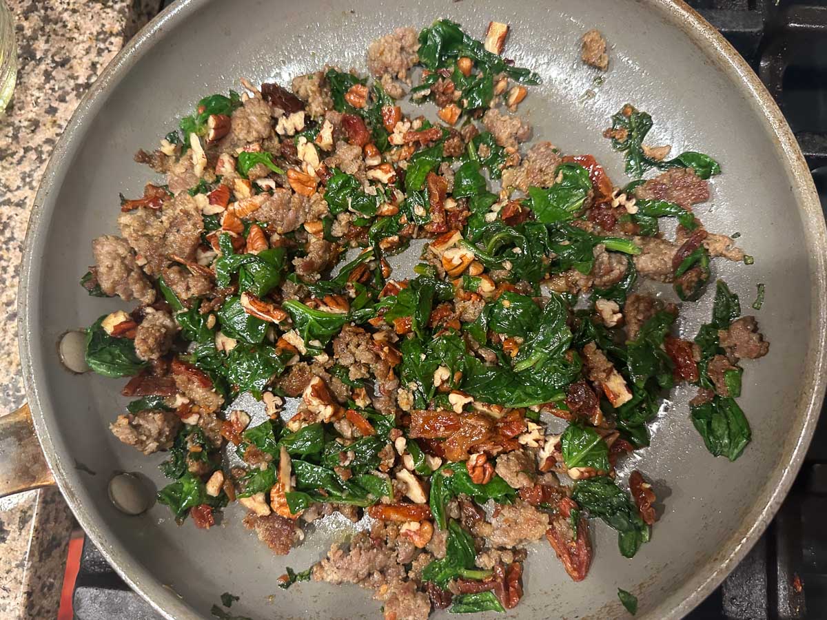 pan with sausage and spinach filling mixture