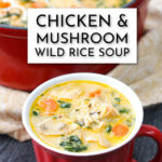 red mug and red dutch oven with creamy chicken and mushroom wild rice soup and text