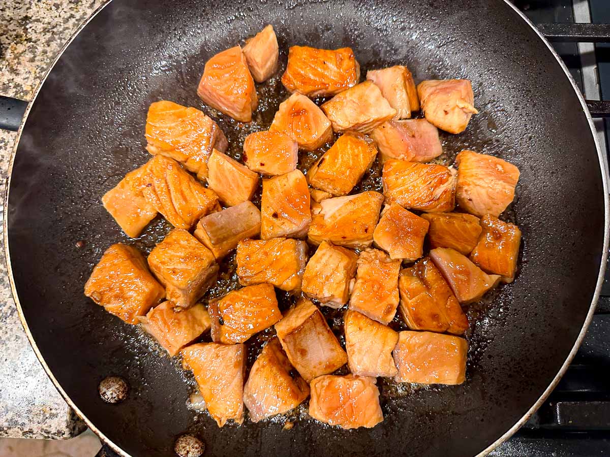 pan with marinated teriyaki salmon bites