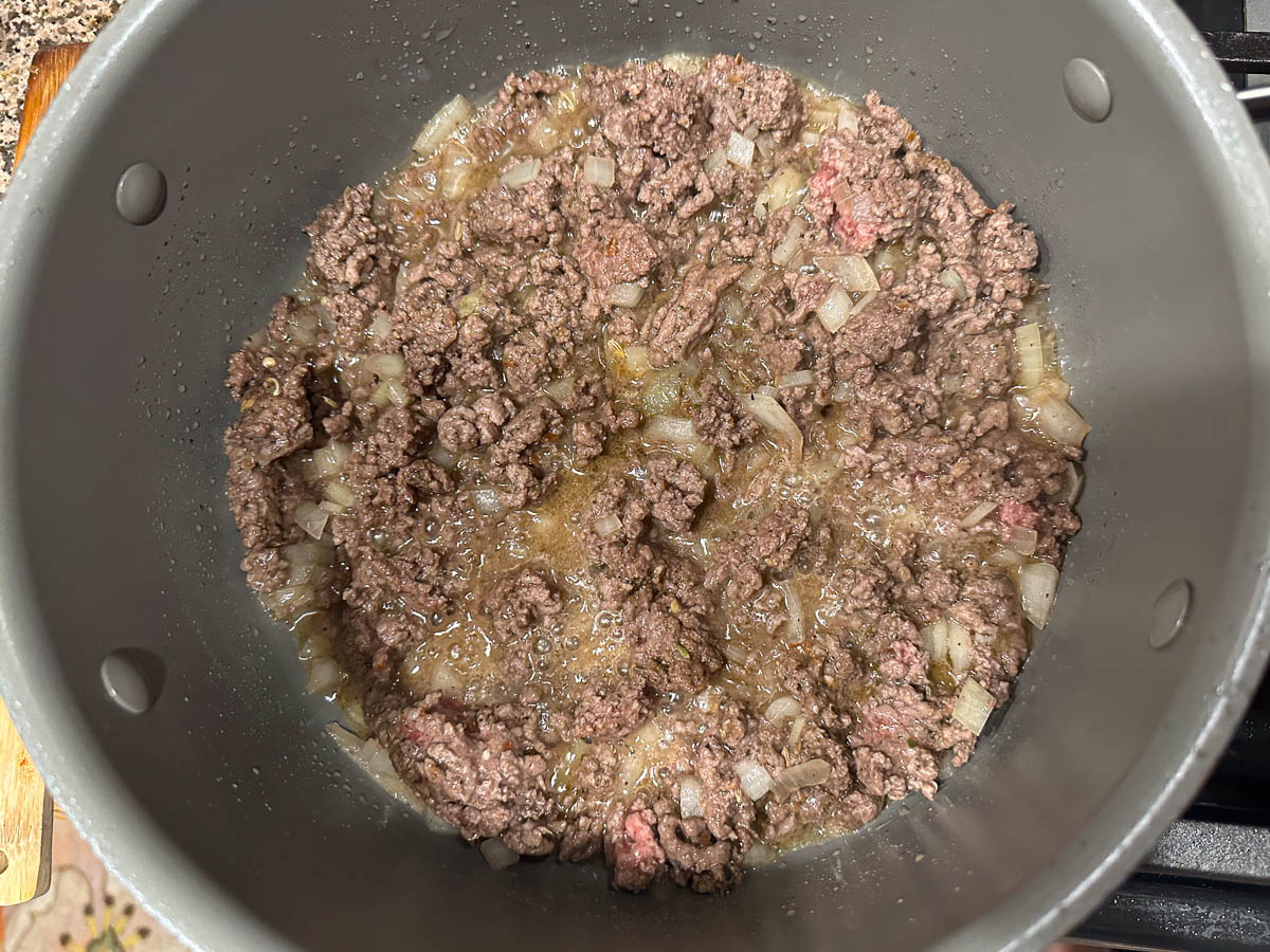 pot with browned ground beef