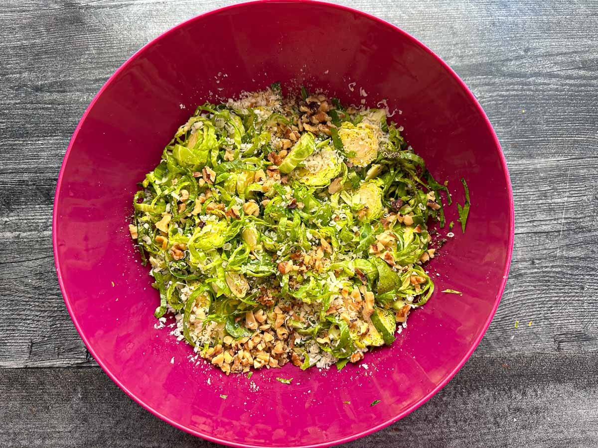 pink bowl with shredded sprouts mixture
