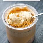 pint container with finished peanut butter Ninja Creami protein ice cream with text