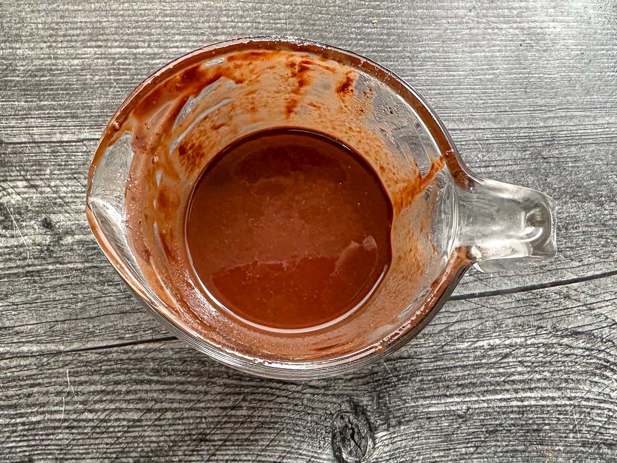 pyrex measuring cup with melted chocolate