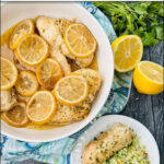 aerial view of white bowl and plate with slow cooker greek chicken and fresh lemons and parsley and text