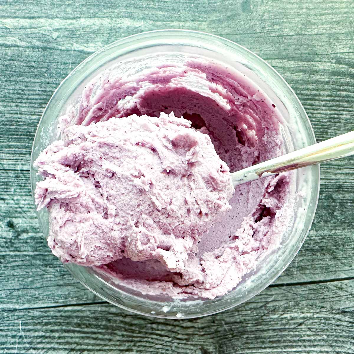 aerial view of a pint container with blueberry cheesecake ice cream made in Ninja Creami