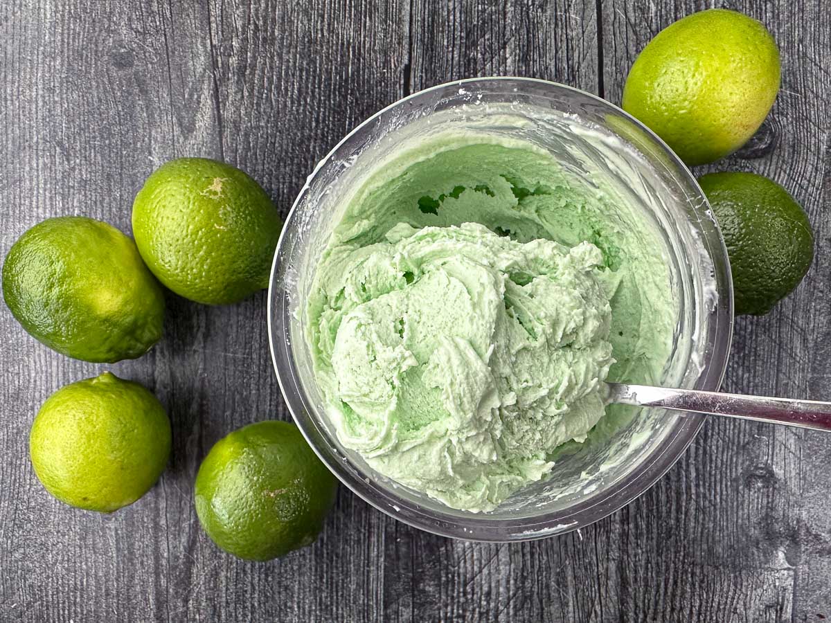 aerial view of finished low carb lime ice cream and fresh limes