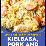 Closeup of a bowl of New Year's pork and sauerkraut with kielbasa and text overlay.