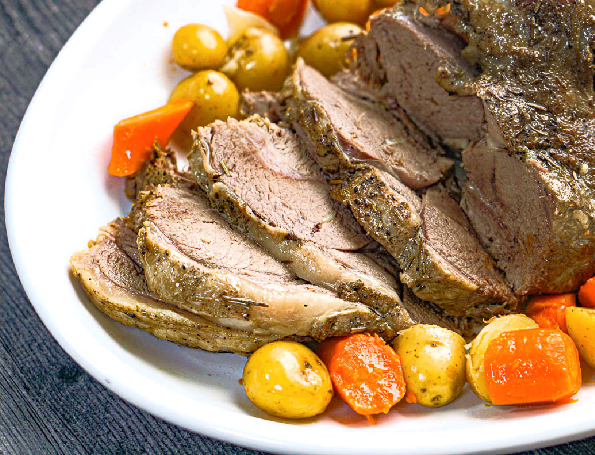 Closeup of sliced lamb roast.