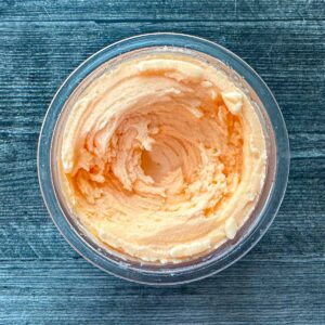 Aerial view of a pint container of the Ninja Creami cantaloupe sorbet.