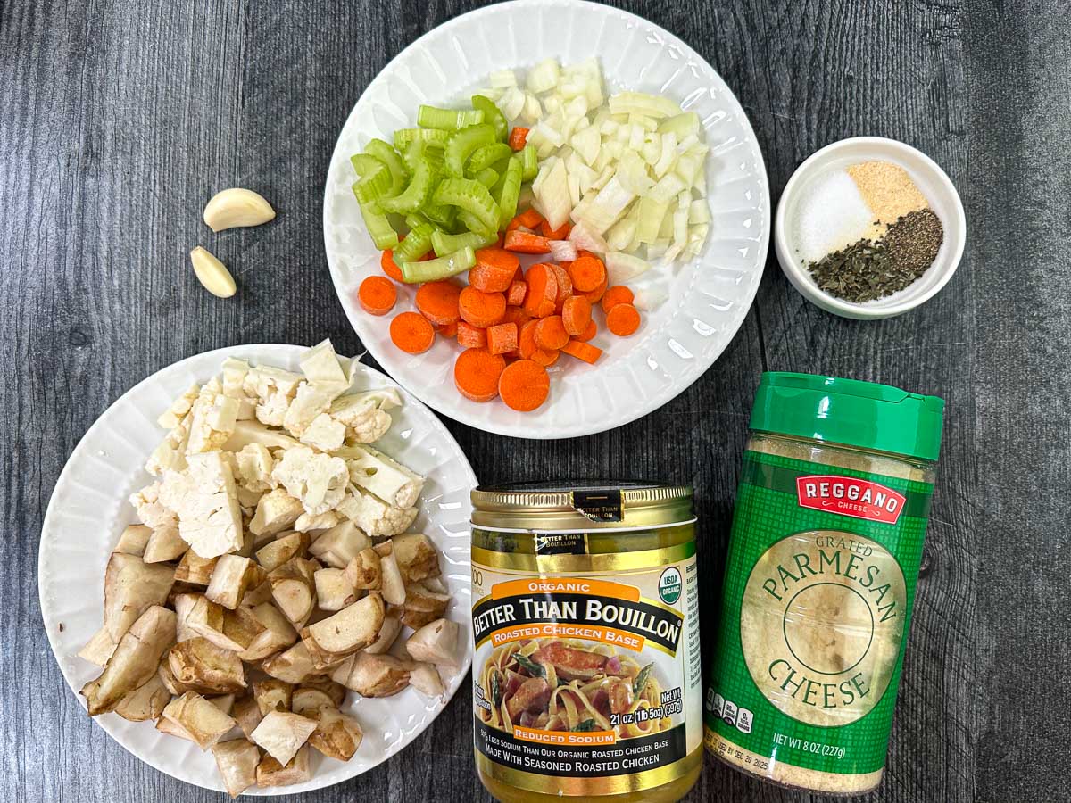 Recipe ingredients - chopped cauliflower and sunchokes, carrots, celery, onion, garlic, parmesan cheese, better that bouillon, and spices.