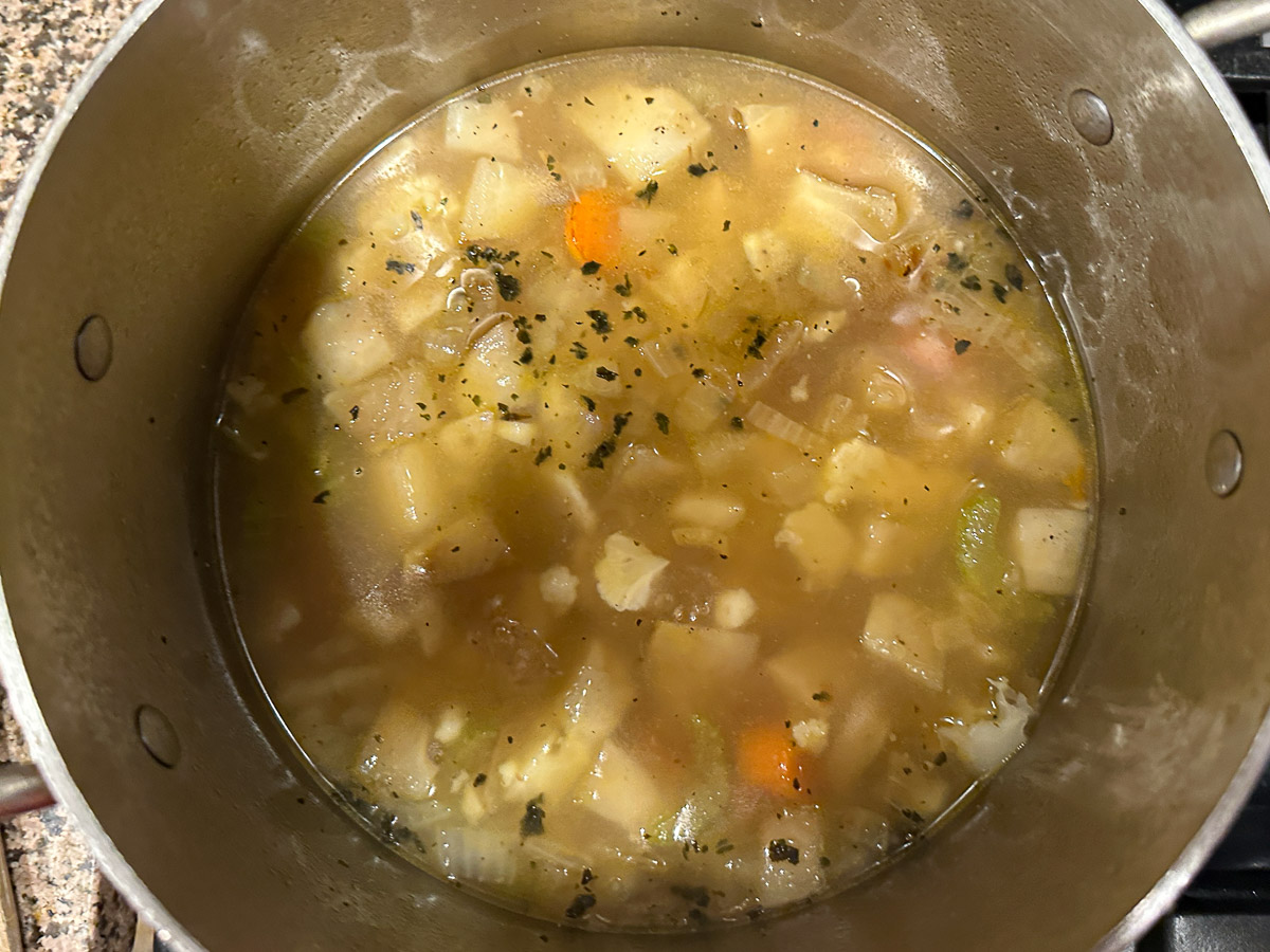 Pot with the finished soup ready to be pureed.