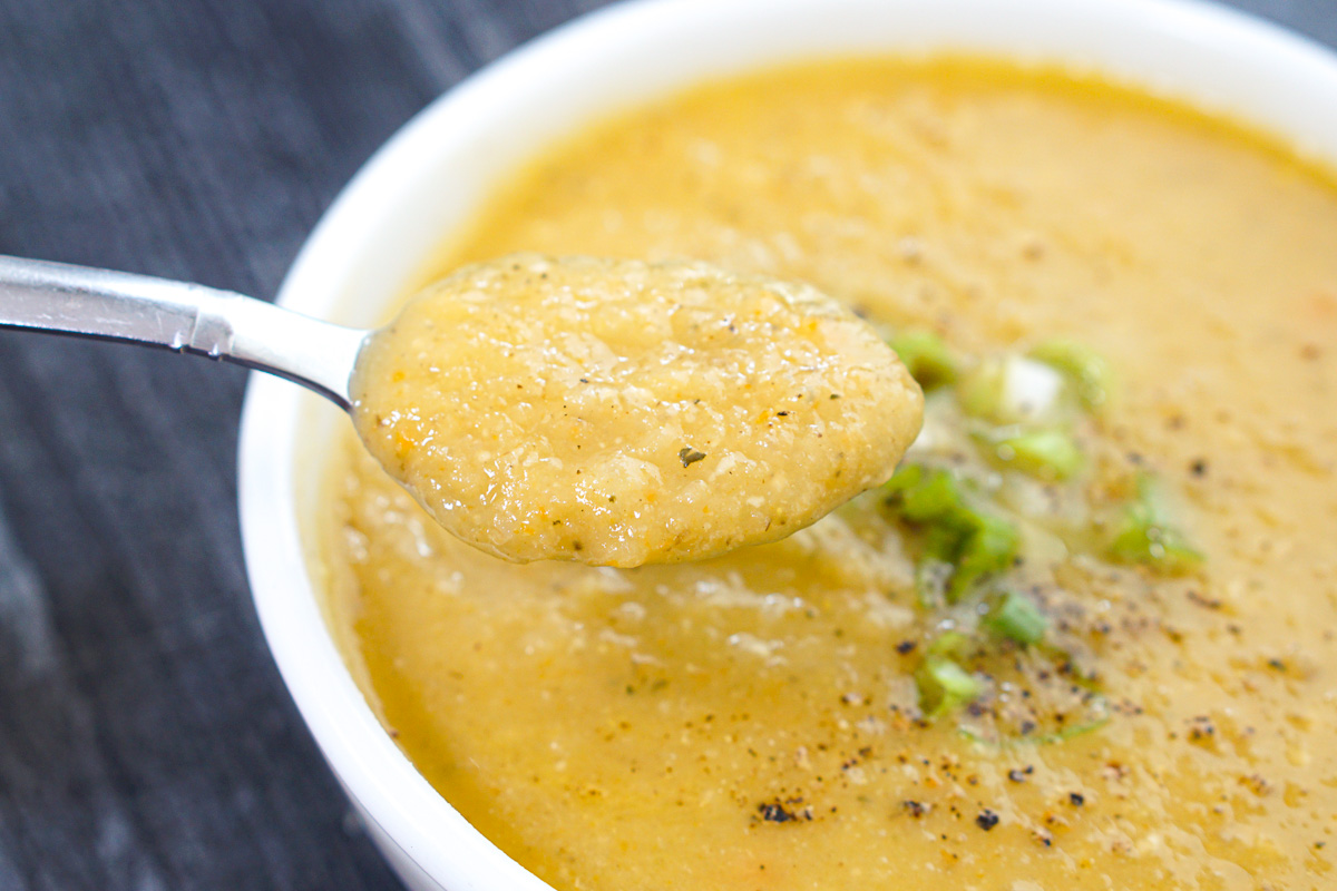 Closeup of a spoonful of the Jerusalem artichoke soup.