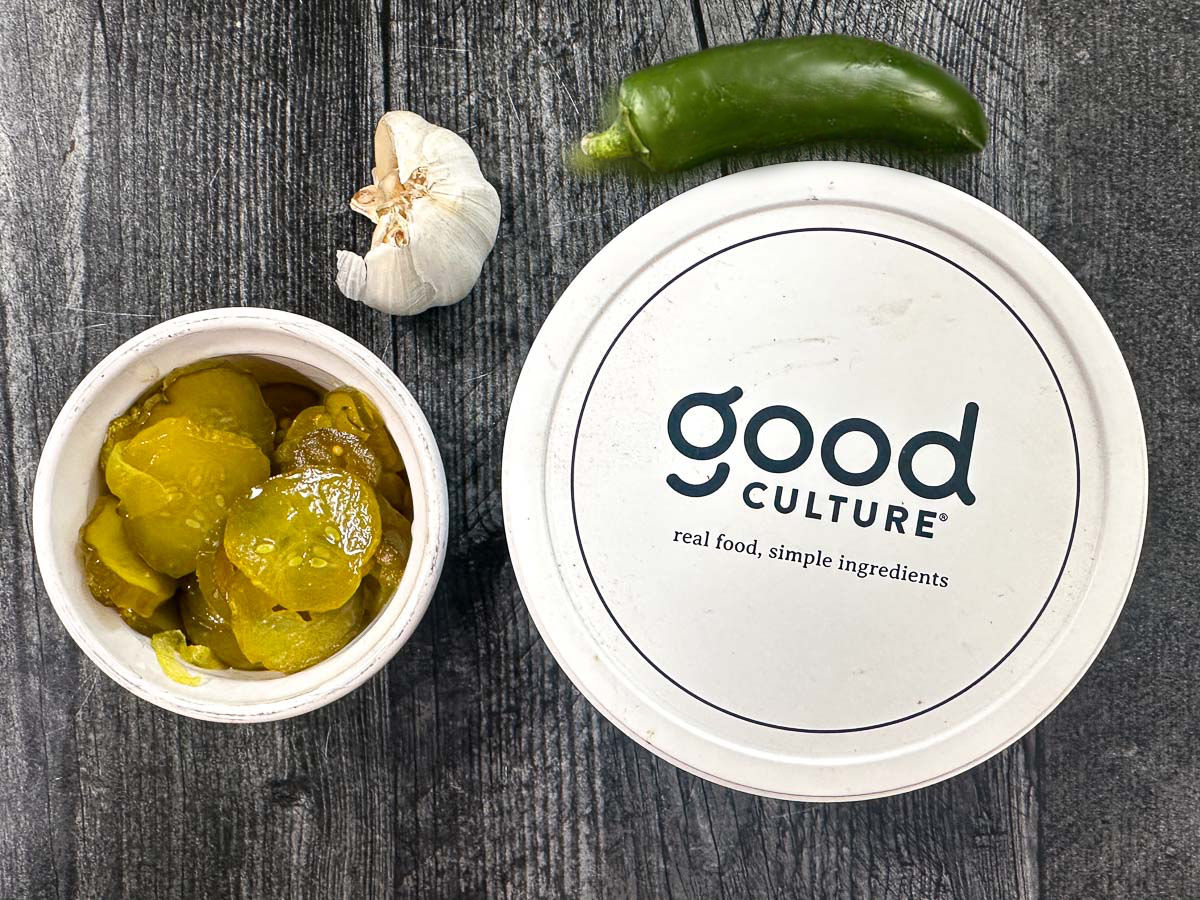 Recipe ingredients - pickles, garlic, jalapeno and cottage cheese. 
