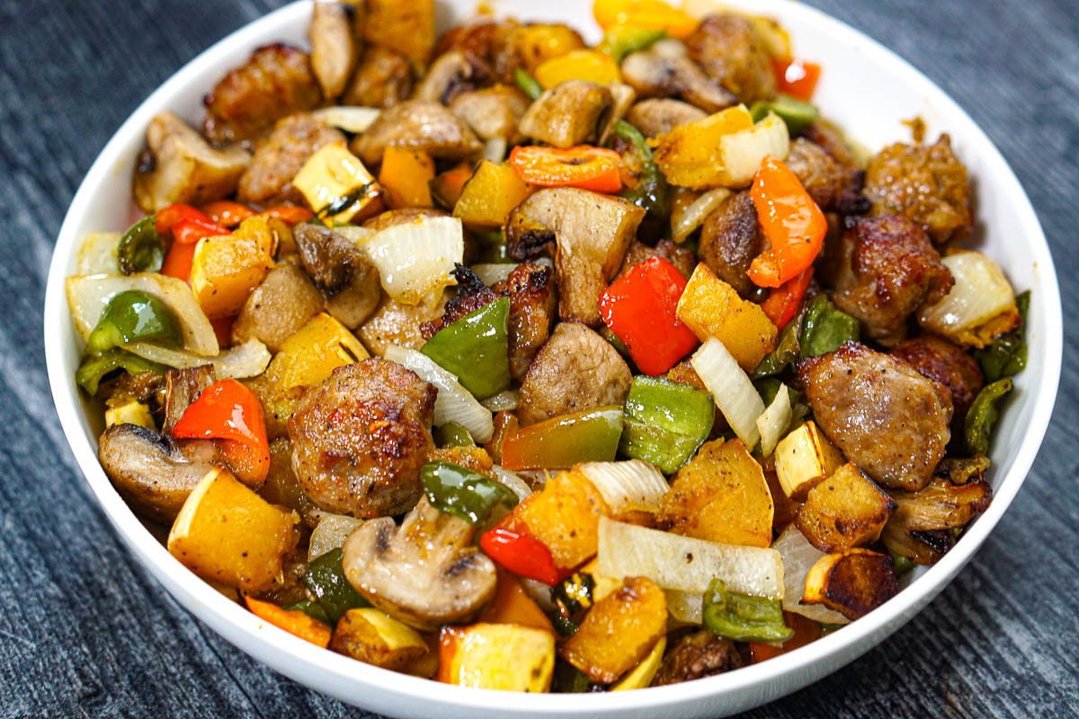 Air fryer veggies with Italian sausage for a quick dinner.