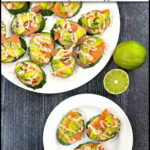 Aerial view of white plates with the cucumber salmon bites and 2 fresh limes and text overlay.