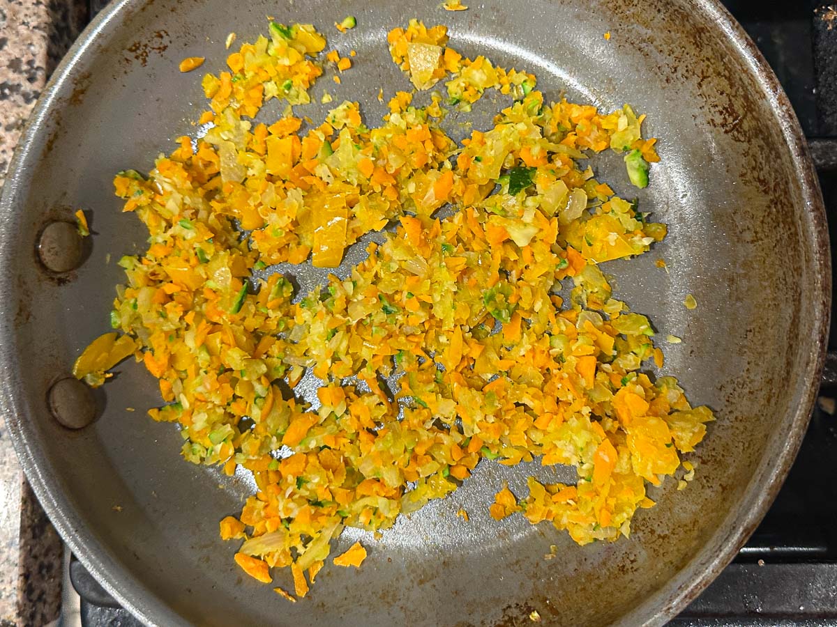 Skillet with sautéed veggies.