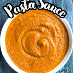 Aerial view of a white bowl with veggie pasta sauce with text overlay.