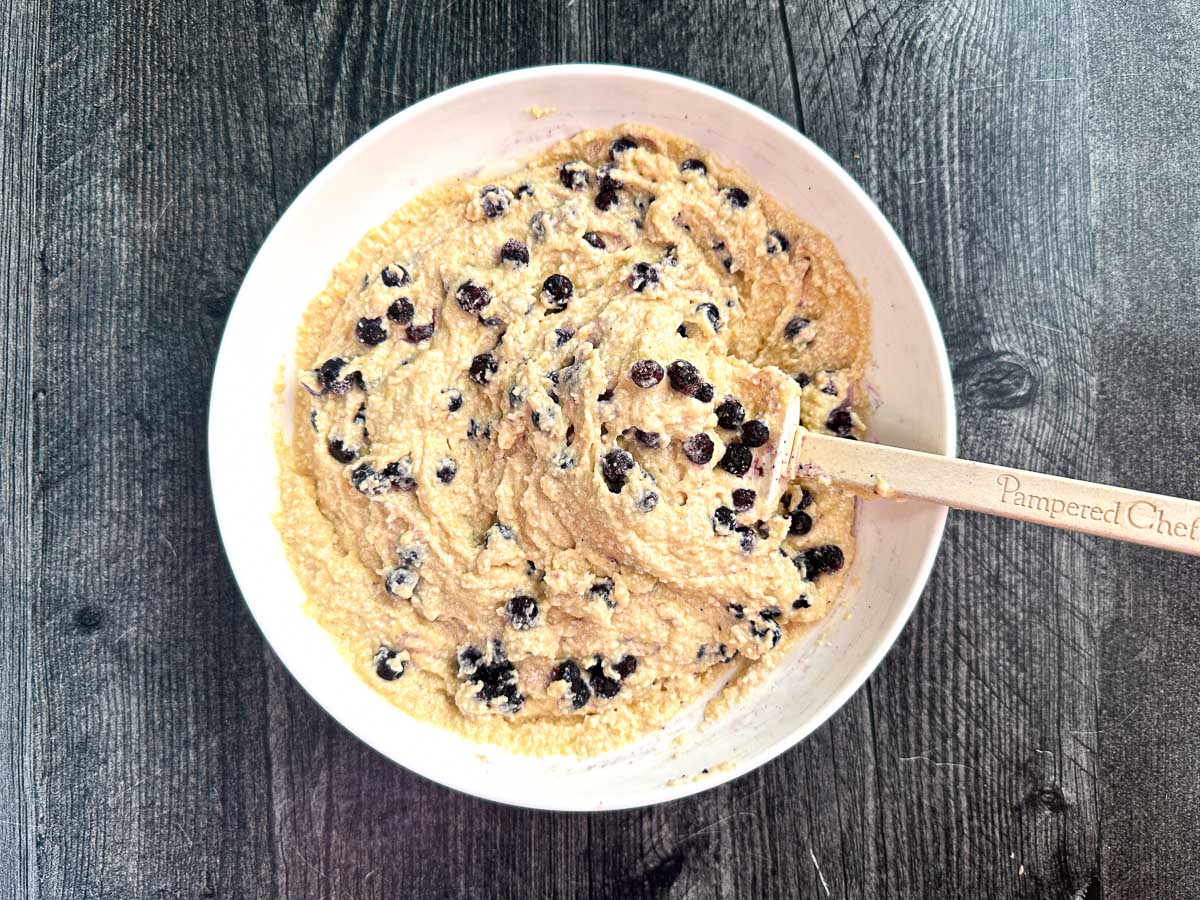 White bowl with the muffin batter.