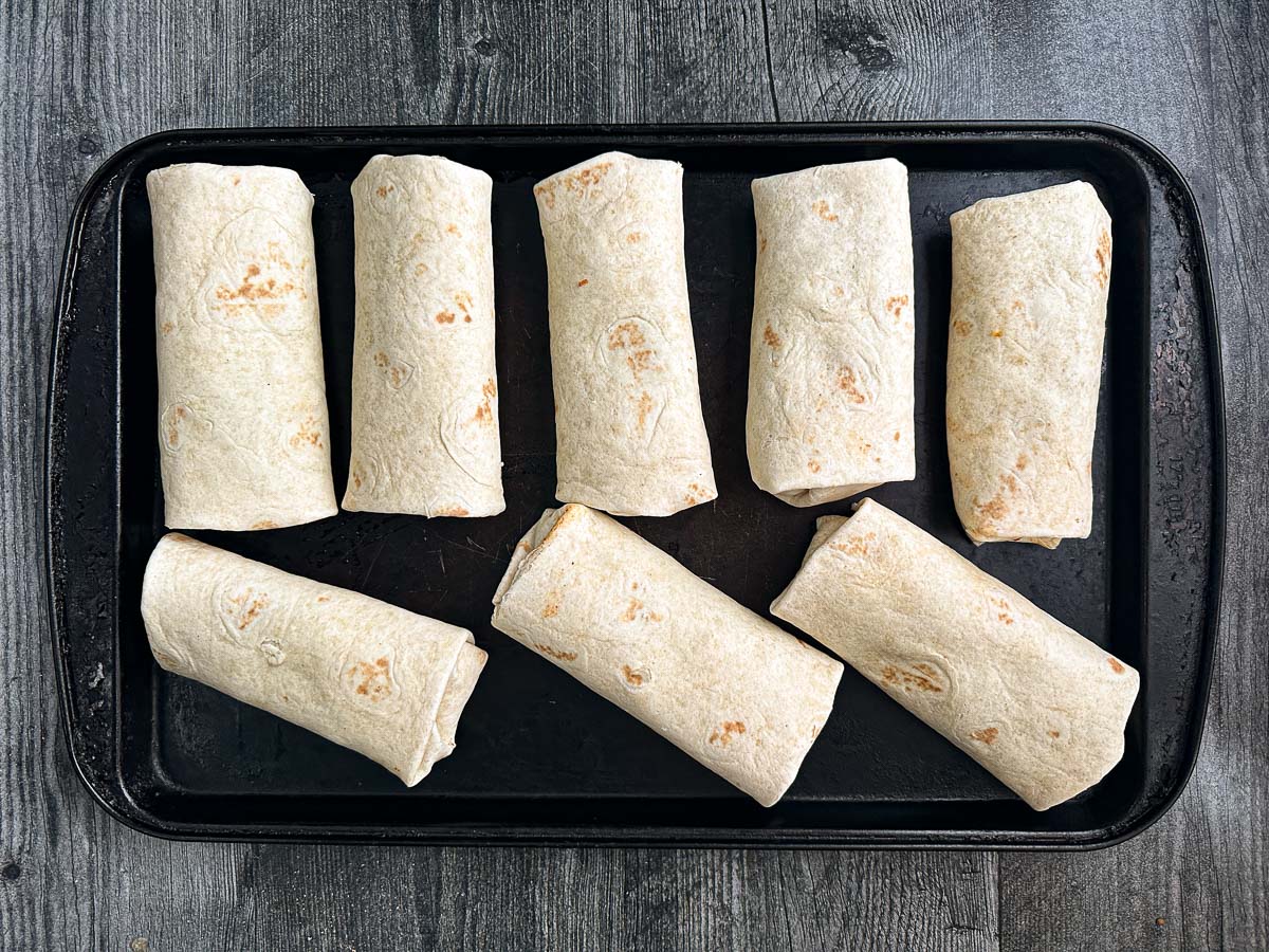 Baking try with all the burritos wrapped and ready to be packaged to freeze.