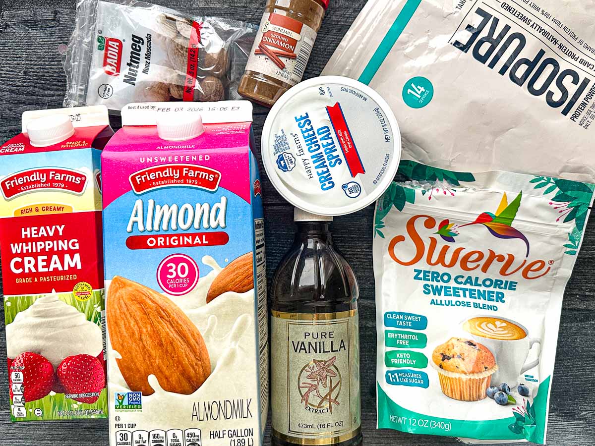 Recipe ingredients - almond milk, heavy cream, creamy cheese, protein powder, sweetener, vanilla extract, nutmeg and cinnamon.