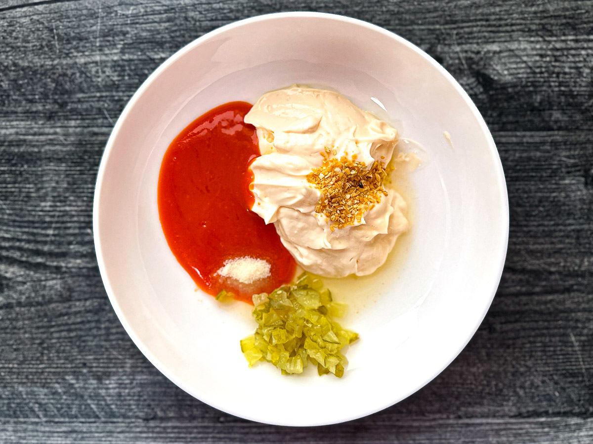 Bowl with ingredients of the special sauce.