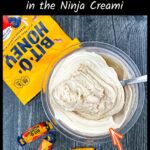 Aerial view of a pint container with keto bit o honey ice cream made in the Ninja Creami and some scattered candies next to it and text overlay.