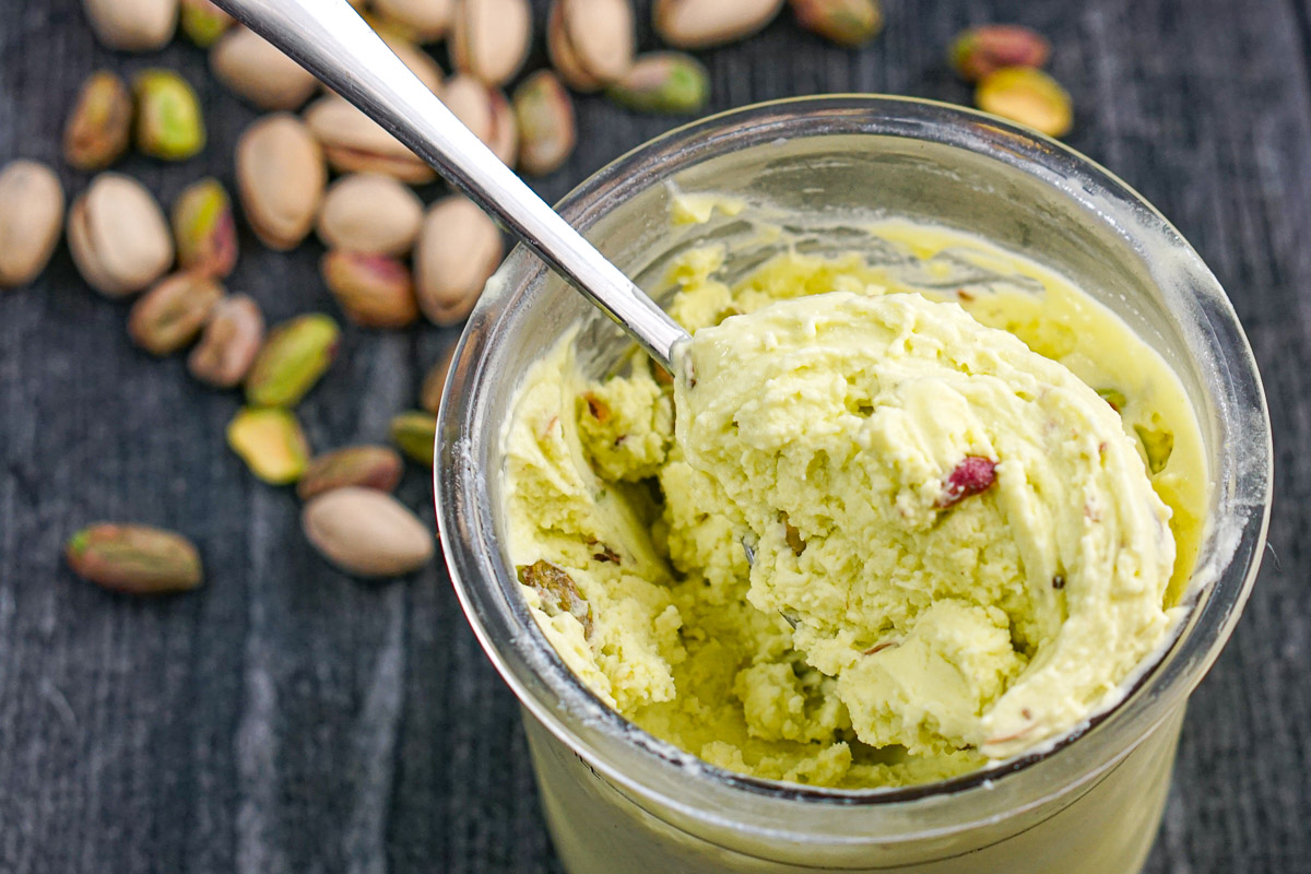 Closeup of the finished recipe and some scattered nuts behind it.