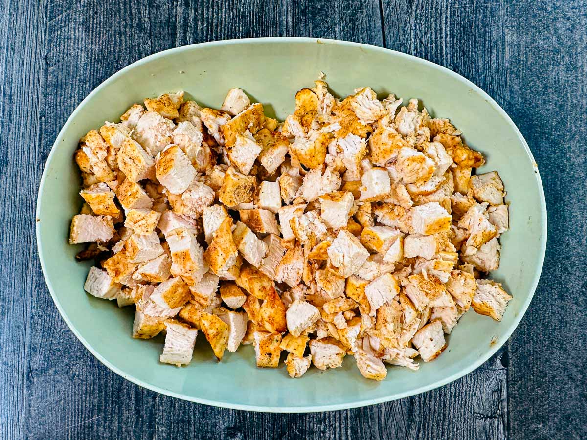 Bowl with the diced cooked chicken cubes