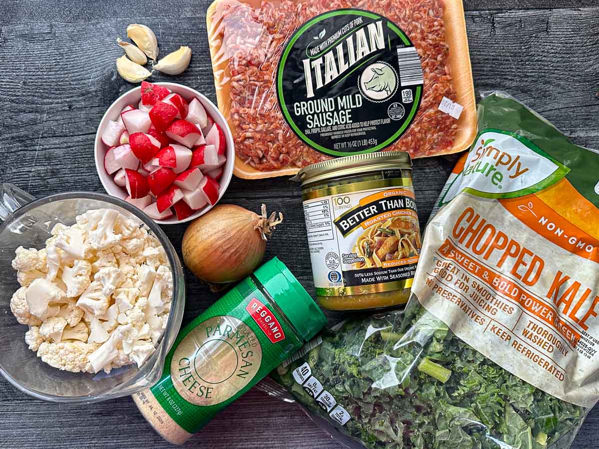 Recipe ingredients - ground Italian sausage, kale, parmesan cheese, cauliflower, radishes, Better than Bouillon, onion, garlic.