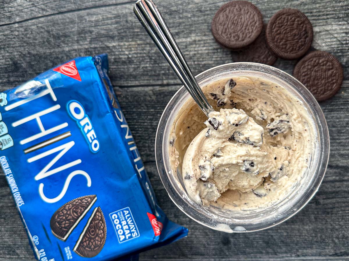 Aerial view of the finished Ninja Creami protein recipe with a bag of Oreo thins.