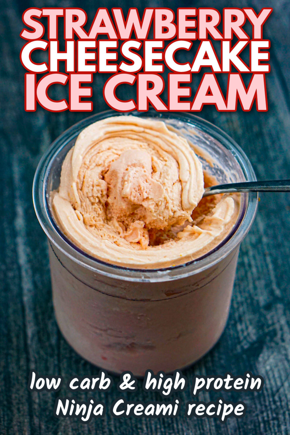 Closeup of a container of Ninja Creami strawberry cheesecake ice cream that's low carb and sugar free with text overlay.